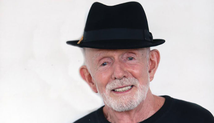 Mas icon Peter Minshall at home last week with his cat Mauvais. PHOTO BY AZLAN MOHAMMED Mas icon Peter Minshall at home last week with his cat Mauvais. PHOTO BY AZLAN MOHAMMED