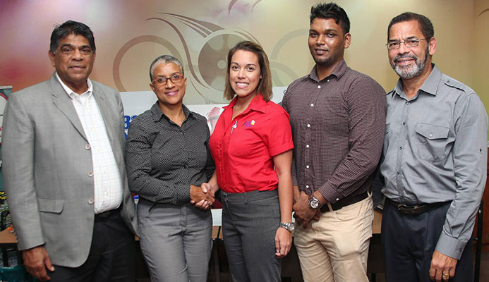 LAUNCH: From 2nd left, Dianne Henderson, chairperson of TTIM shakes hands with Kiss baking representative Sarah Jones as Diabetes Association vice president Andrew Dhanoo, Francis William Smith, director at TTIM, and at left, Tony Harford TTIM member looks on during the launch of the 2018 TT International Marathon at Olympic House, Port of Spain. LAUNCH: From 2nd left, Dianne Henderson, chairperson of TTIM shakes hands with Kiss baking representative Sarah Jones as Diabetes Association vice president Andrew Dhanoo, Francis William Smith, director at TTIM, and at left, Tony Harford TTIM member looks on during the launch of the 2018 TT International Marathon at Olympic House, Port of Spain.