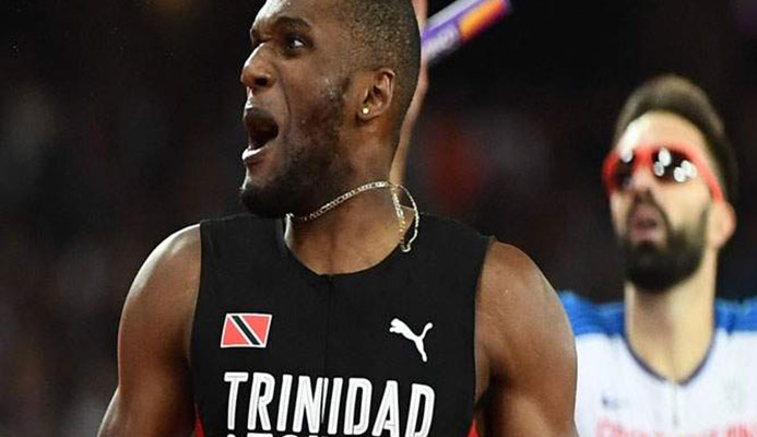 SAVOURING THE MOMENT: Trinidad and Tobago’s Lalonde Gordon looks to the stands after completing victory in the men’s 4x400m final at the IAAF World Championships in London on Saturday. —Photo: AFP SAVOURING THE MOMENT: Trinidad and Tobago’s Lalonde Gordon looks to the stands after completing victory in the men’s 4x400m final at the IAAF World Championships in London on Saturday. —Photo: AFP