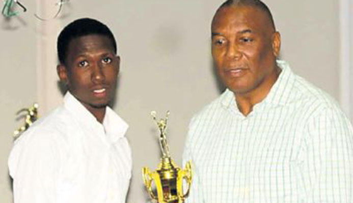 Jaden St Louis receives his award from NAAA’s President Ephraim Serrette. Jaden St Louis receives his award from NAAA’s President Ephraim Serrette.