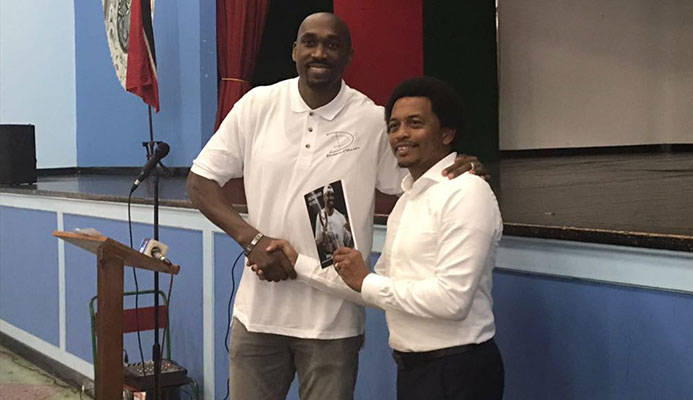Former pro basketballer Kibwe Trim shows off his book at his alma mater St Mary’s College yesterday. Former pro basketballer Kibwe Trim shows off his book at his alma mater St Mary’s College yesterday.