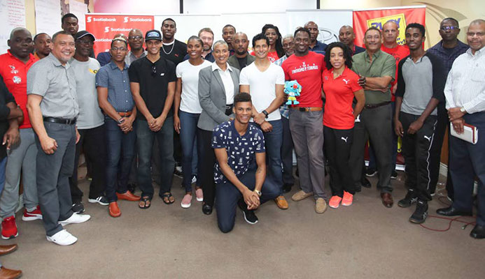 A group of national athletes and officials pose for a photo at the Olympic House, Port of Spain yesterday, during the ceremonial send-off for the TT Commonwealth Games contingent yesterday. A group of national athletes and officials pose for a photo at the Olympic House, Port of Spain yesterday, during the ceremonial send-off for the TT Commonwealth Games contingent yesterday.
