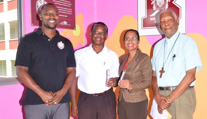 From left, football coach Richard Goddard, Project Chairman for the Bishops High School new sport field - Dr Alison Williams, Acting Principal Cindy Ramnarine and Chairman of the Board of Governors of the school, Archdeacon Kenneth Forrester, display pen drives that are on sale to help raise funds for the schools $4 million sports ground. From left, football coach Richard Goddard, Project Chairman for the Bishops High School new sport field - Dr Alison Williams, Acting Principal Cindy Ramnarine and Chairman of the Board of Governors of the school, Archdeacon Kenneth Forrester, display pen drives that are on sale to help raise funds for the schools $4 million sports ground.