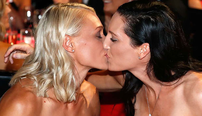 AFLW – and Erin Phillips’ kiss of partner Tracy Gahan – has gone a long way to normalising same-sex relationships. Photograph: Michael Willson/AFL Media/Getty Images  AFLW – and Erin Phillips’ kiss of partner Tracy Gahan – has gone a long way to normalising same-sex relationships. Photograph: Michael Willson/AFL Media/Getty Images