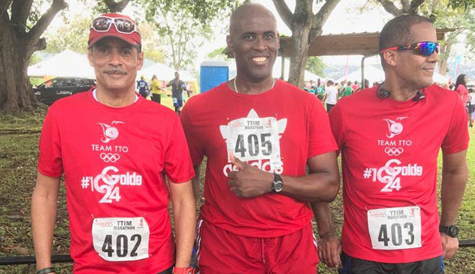 Walking in support of the T&T Olympic Committee fundraising project during last Sunday’s T&T International Marathion were sports commentator and writer Andre Errol Baptiste, Olympic shooter Roger Daniel and sports enthausaist Nigel Mark Baptiste. Walking in support of the T&T Olympic Committee fundraising project during last Sunday’s T&T International Marathion were sports commentator and writer Andre Errol Baptiste, Olympic shooter Roger Daniel and sports enthausaist Nigel Mark Baptiste.