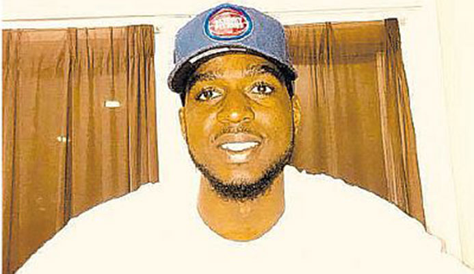 T&T’s Johnny Hamilton signs on the dotted line. T&T’s Johnny Hamilton signs on the dotted line.