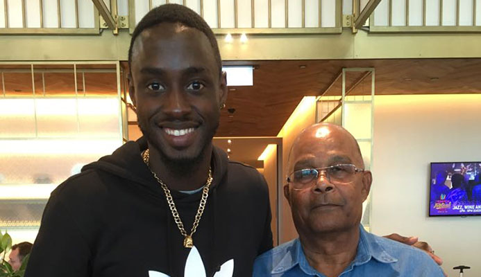 Jereem Richards (left) and Kenneth Ferguson pose with his 200m gold medal at LAX Airport. Jereem Richards (left) and Kenneth Ferguson pose with his 200m gold medal at LAX Airport.