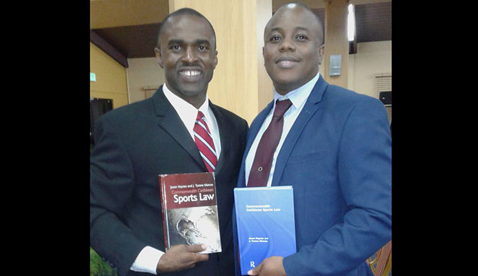 Tyrone Marcus (left) and Jason Haynes, after Tuesday's book launch at St Augustine. Tyrone Marcus (left) and Jason Haynes, after Tuesday's book launch at St Augustine.