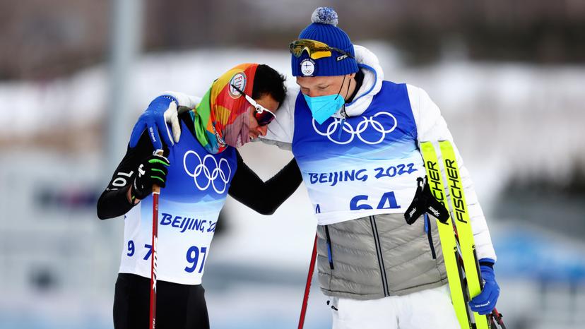 Carlos Andres Quintana was embraced by gold medallist Iivo Niskanen of Finland after their 15km cross-country skiing event. Credit: Clive Rose/Getty Images Carlos Andres Quintana was embraced by gold medallist Iivo Niskanen of Finland after their 15km cross-country skiing event. Credit: Clive Rose/Getty Images