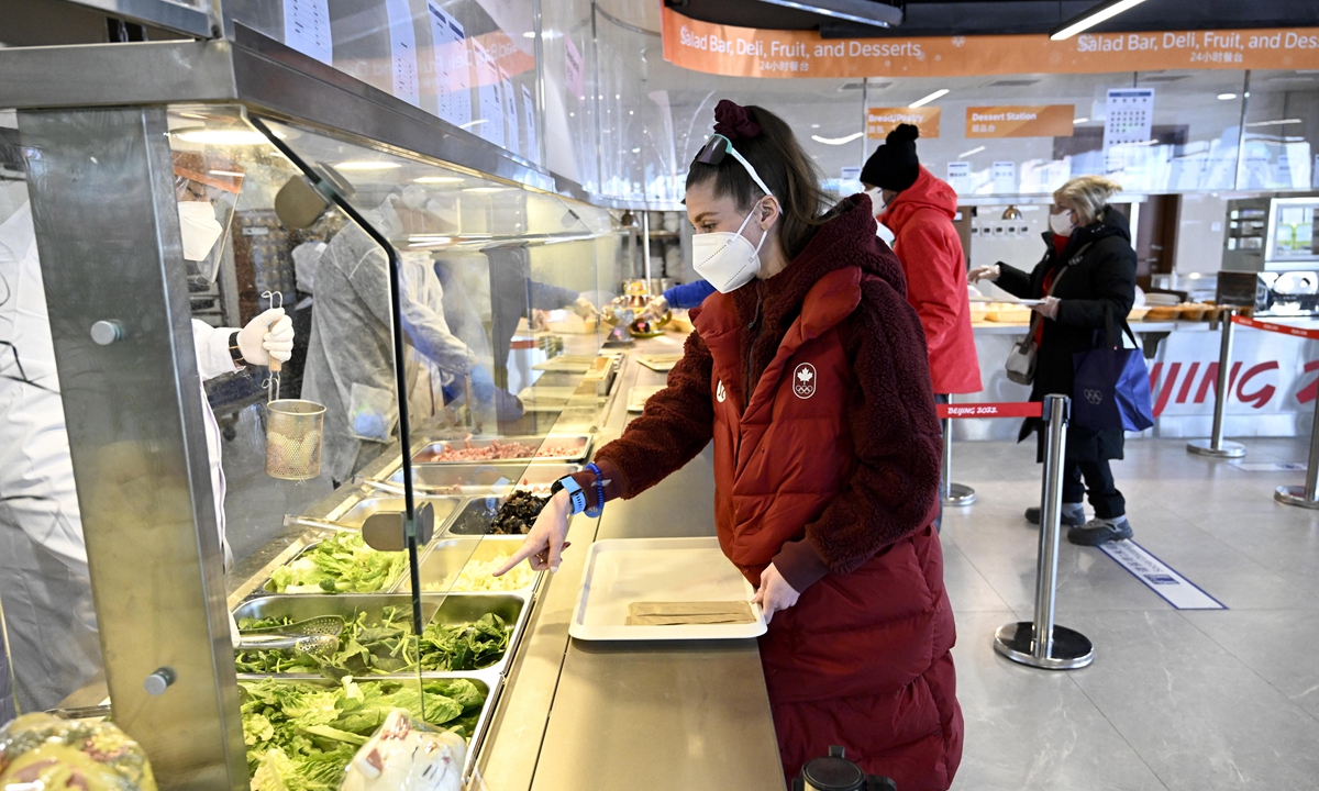 An athlete orders food at a restaurant at the Olympic Village on February 1, 2022, in Beijing. Photo: VCG An athlete orders food at a restaurant at the Olympic Village on February 1, 2022, in Beijing. Photo: VCG
