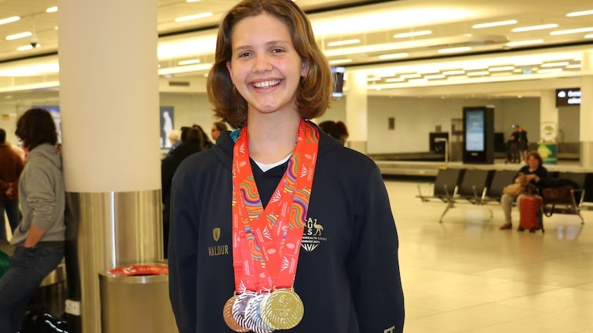 Inez Miller with her seven medals from the Trinbago Commonwealth Youth Games.(ABC News: David Weber) (Image obtained at abc.net.au) Inez Miller with her seven medals from the Trinbago Commonwealth Youth Games.(ABC News: David Weber) (Image obtained at abc.net.au)