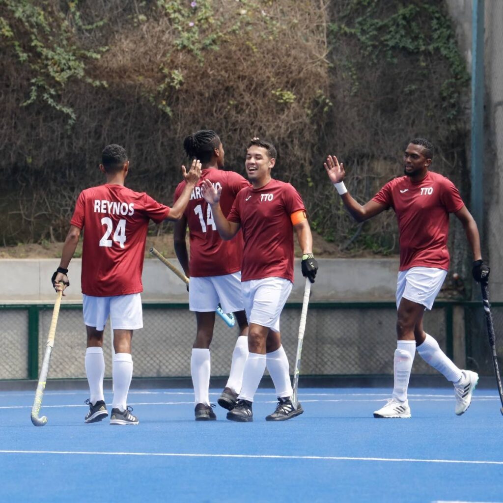 Trinidad and Tobago hockey men's players celebrate a goal. PHOTO COURTESY PAN AMERICAN HOCKEY FEDERATION FACEBOOK PAGE - (Image obtained at newsday.co.tt) Trinidad and Tobago hockey men's players celebrate a goal. PHOTO COURTESY PAN AMERICAN HOCKEY FEDERATION FACEBOOK PAGE - (Image obtained at newsday.co.tt)