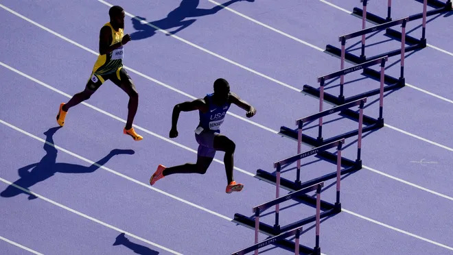 Rai Benjamin (USA) and Jaheel Hyde (Jamaica) in the 400-meter hurdles preliminary heat during the Paris 2024 Olympic Summer Games at Stade de France on Aug. 5, 2024. Andrew Nelles, USA TODAY Sports (Image obtained at usatoday.com) Rai Benjamin (USA) and Jaheel Hyde (Jamaica) in the 400-meter hurdles preliminary heat during the Paris 2024 Olympic Summer Games at Stade de France on Aug. 5, 2024. Andrew Nelles, USA TODAY Sports (Image obtained at usatoday.com)