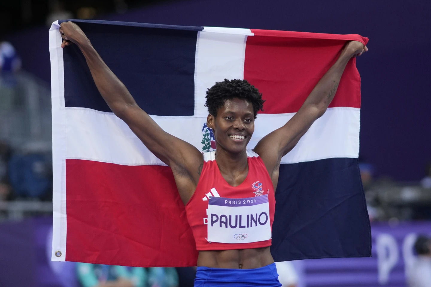 Marileidy Paulino, of the Dominican Republic, celebrates winning the women’s 400-meter final at the 2024 Summer Olympics, Friday, Aug. 9, 2024, in Saint-Denis, France. (AP Photo/Bernat Armangue) (Image obtained at apnews.com) Marileidy Paulino, of the Dominican Republic, celebrates winning the women’s 400-meter final at the 2024 Summer Olympics, Friday, Aug. 9, 2024, in Saint-Denis, France. (AP Photo/Bernat Armangue) (Image obtained at apnews.com)