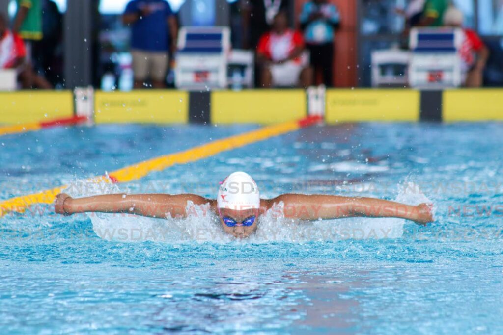 Trinidad and Tobago's Zuri Ferguson competes in the girls' butterfly on the opening day of the 2025 Carifta Aquatics Championships, on April 19, at the National Aquatic Centre, Couva. - Photos by Grevic Alvarado (Image obtained at newsday.co.tt)