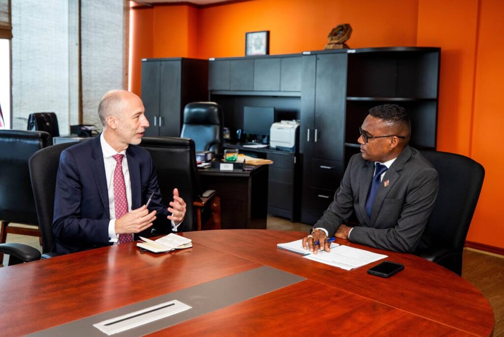 Minister of Sport and Youth Affairs Phillip Watts (R) has a discussion with British High Commissioner Jon Dean during a courtesy call on June 11. - Photo courtesy the Ministry of Sport and Youth Affairs (Image obtained at newsday.co.tt)