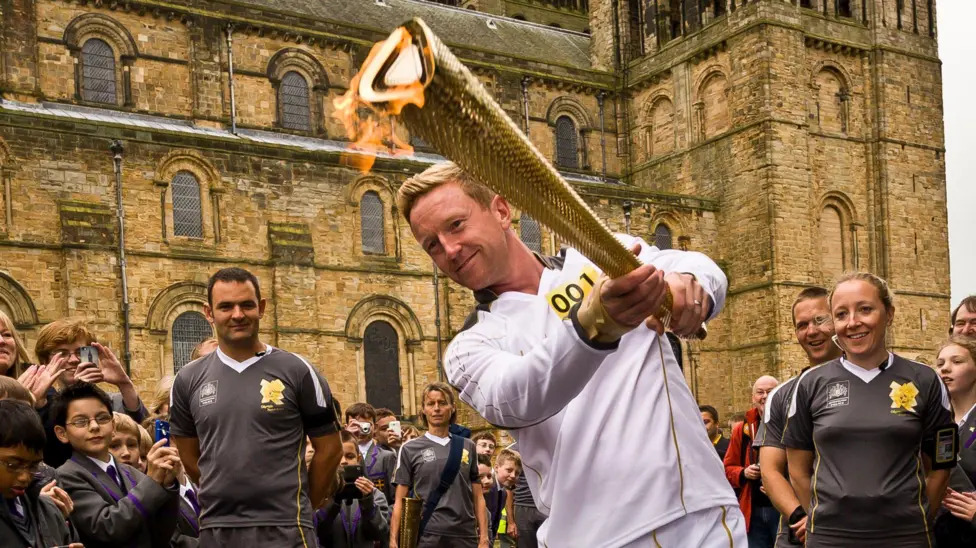 Paul Collingwood was part of the Olympic torch relay in Durham before the London 2012 Olympic Games while an England cricketer (Image obtained at bbc.com)