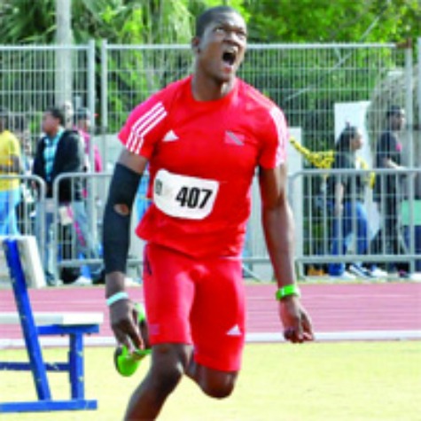 OLYMPIC FINALIST: Trinidad and Tobago's Keshorn Walcott competes in the Carifta Games boys' under-20 javelin, at the National Stadium in Hamilton, Bermuda, in April. Walcott won with a record-breaking 77.59 metres throw. Yesterday, the 19-year-old athlete qualified for the Olympic final. —Photo courtesy PAUL VOISIN